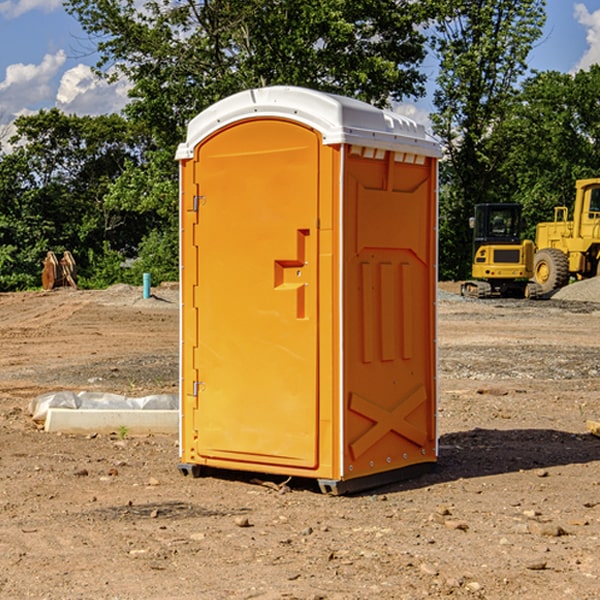 how often are the porta potties cleaned and serviced during a rental period in Grassy Meadows